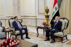 محافظ البنك المركزي يلتقي رئيس جمهورية العراق