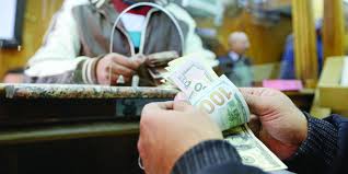 The daily exchange rate of the dinar per US $ in the window of buying and selling foreign currency